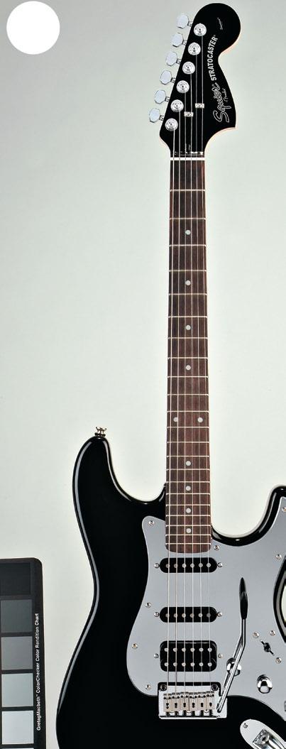 Fat Strat 032-1703 The Black & Chrome Fat Strat features one humbucking pickup (bridge), two AlNiCo single coil pickups, and knurled chrome control knobs.