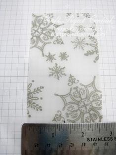 Step 6 Using only one sheet of the snowflake embossed Vellum cut six 2-5/8 x 4-1/2 pieces.