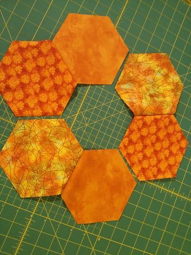 prints, and cut 6 5-1/4 x 6-1/2 rectangles Use the hexagon template to cut 2 hexagons from