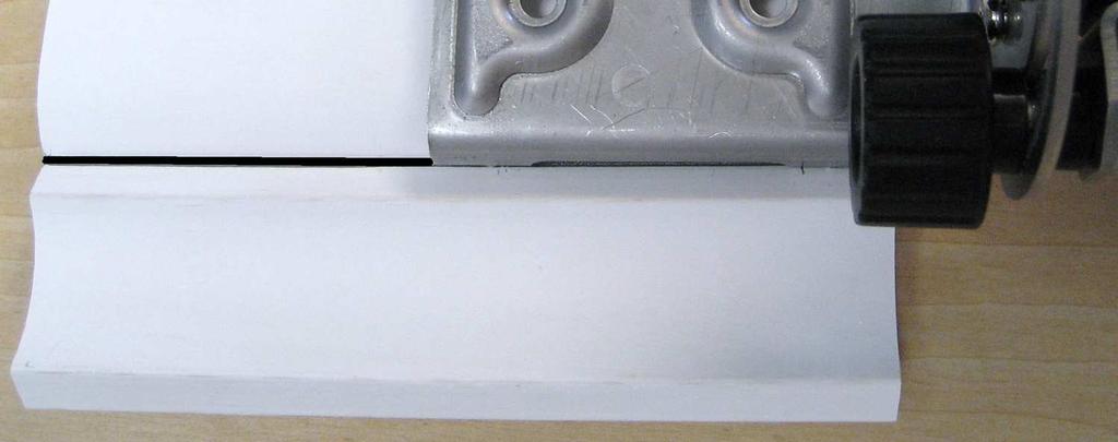 Re-tighten the lock knobs 1 2 3 4. Draw a parallel line to the edge of the trim or use a groove to align the spring arm. 5.