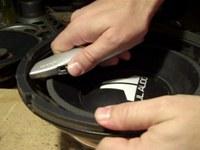 Step 3 Slip the point of your razor knife between the gasket and the speaker
