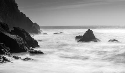 I particularly like turning photographs shot with ND filters into black and