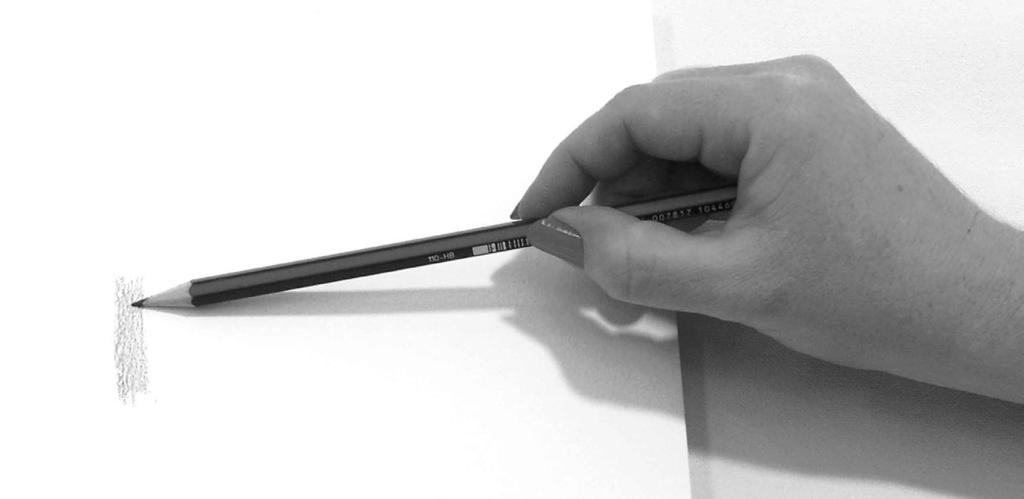 -3 - Notice the way the back end of the pencil is securely tucked inside the hand and a pinchgrip is made on the post of the pencil.