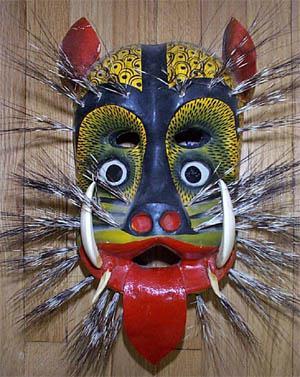 This jaguar mask from Mexico also emphasizes Shape. What shapes do you see? Are they Geometric, Organic or both? Are the shapes arranged symmetrically or asymmetrically?