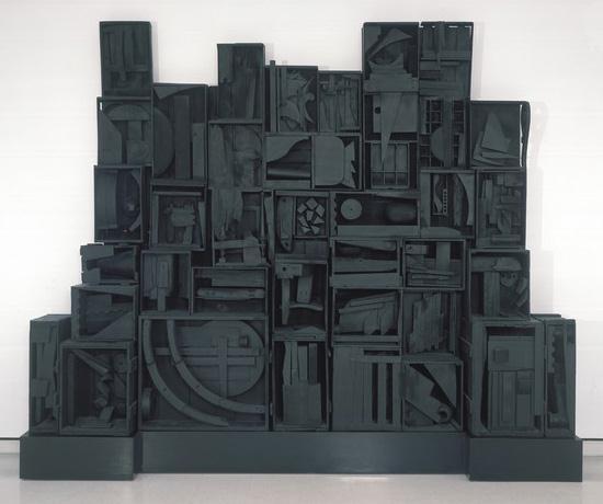 How many shapes do you recognize in this work? Why do you think you notice the shapes first in this sculpture? This is an assemblage. Nevelson collected scraps of wood and assembled this sculpture.