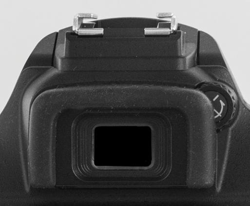 To set the viewfinder focus, remove the lens cap, look through the viewfinder, and then press the shutter button halfway to display data at the bottom of the viewfinder.