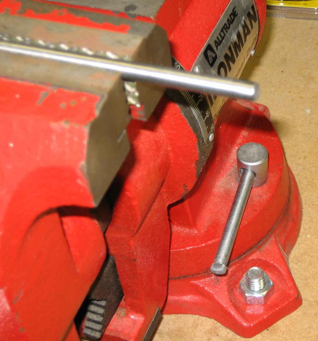 In order to thread the rod you need to clamp it into a vise.