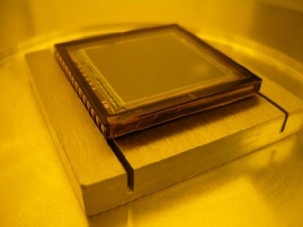 Given that the CCD image sensor is prepackaged in a chip to work with the Kodak daughter board, the size of the image sensor is considerably thicker than the typical wafer used with the Suss Mask