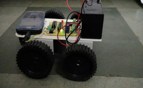 VI. VEHICLE MOVEMENT Chassis is the platform of the robot vehicle, which is used to mount the mobile and DTMF circuitry. A cell phone is connected to a vehicle through 3.5mm audio jack.