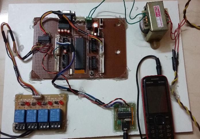 In this project the motor, is controlled by a mobile phone that makes call to the mobile phone attached to the circuit in the course of the call, if any button is pressed control corresponding to the