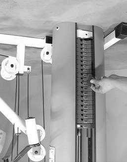 Locate the L-Locking Pin (#25). 2. Insert the L-Locking Pin (#25) through the Leg Extension Bench Frame (#11) and the Leg Extension Arm (#12), as shown above.