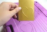 This will help the tool glide smoothly over the card, and also, if you rub hard enough, the lines will