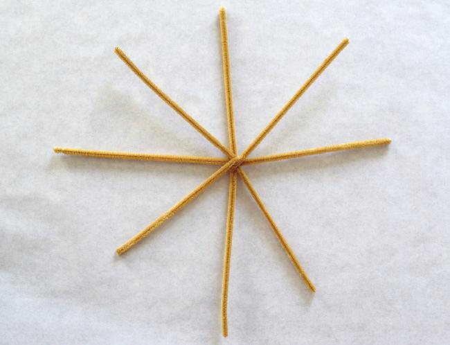 Do it again to create a total of two X shapes. STEP 2: Make a star.
