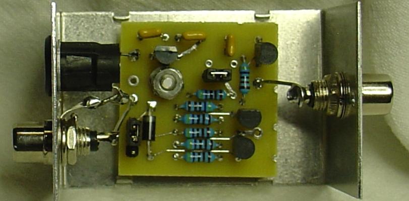 I built my first flexible amp-key interface into a small aluminum project box as shown in Photos C below.