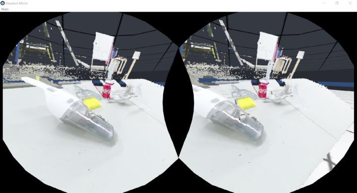 The operator can interact with these windows by grabbing them, either with the controller or glove. Figure 4 shows an example with two virtual windows located near the robot.
