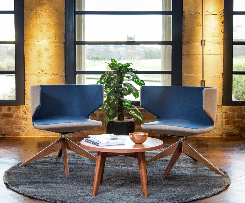 Blurred Lines Below Mr Jones armchairs with four star wooden base, finished in polished walnut, and Jude coffee table with walnut finish.
