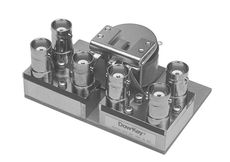 46 Series DPDT Switch This DPDT switch is two SPDT relays (similar to the DowKey 164 Series) mounted together on a common plate with a single actuating coil.