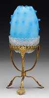 ormolu mirrored stand. Lot also includes a Clarke's Pyramid candle. SIZE: 6-3/4" t.