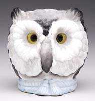 $488.75 FIGURAL FAIRY LAMP. Bisque painted owl in shades of gray, blue tassel and rope base, transparent amber eyes. SIZE: 3-1/2" t x 3-1/2" w. CONDITION: Very good with replacement eyes.