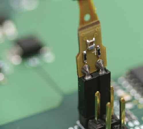 Two very small damping resistors are directly soldered into the connect points providing a reliable, intermittence-free electrical connection.