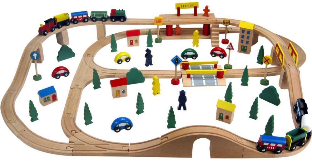 A SLIGHTLY LARGER LAYOUT Add a few pieces of scenery, a grade crossing, maybe some switches and a few other accessories and just watch how it becomes