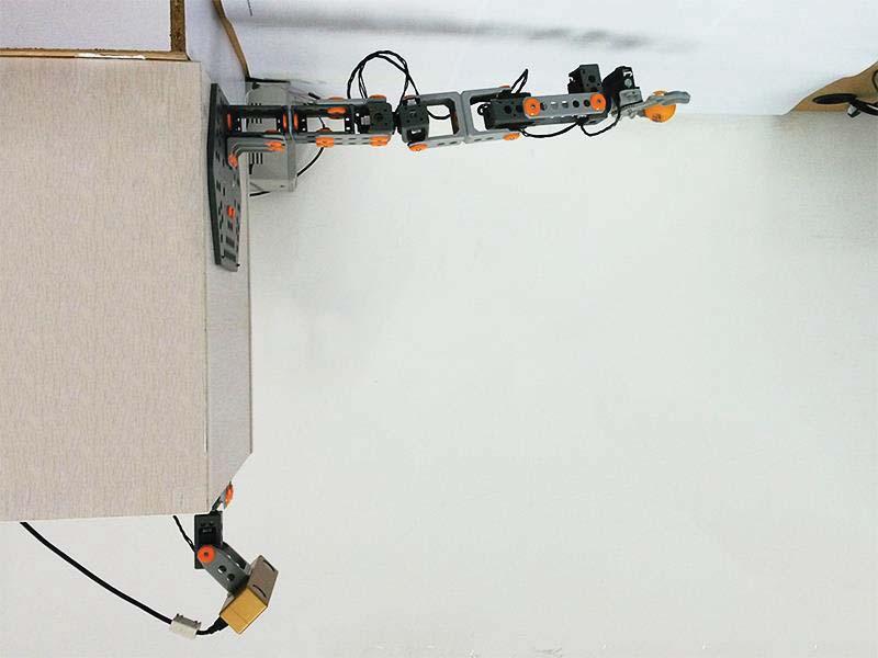 Picture B illustrates the touch sensor mounted in the gripper. III. THE METHODS A. The Human-like Robotic Hand-eye Coordination System Figs.