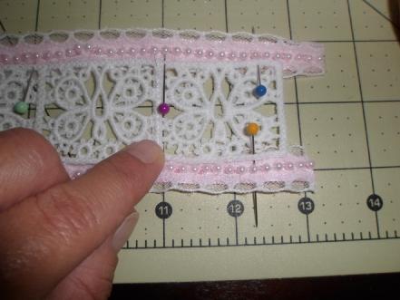 Another trim example. Pin trims in place & topstitch along the straight edge of my lace.