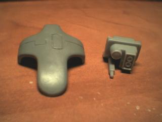 Here are the two pieces of the front turret that require modification on the left is the t shaped piece, and on the right is the targeting array: should leave plenty of room for the cutting process