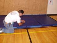 Although there is no climbing industry standard that specifically dictates the thickness or dimensions of a landing surface mat, We recommend that the landing surface cover an area up to 8 feet from