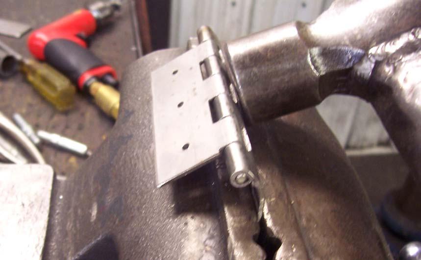 Use a vise and hammer to curve the longer flange to match the curve of the Pedals.
