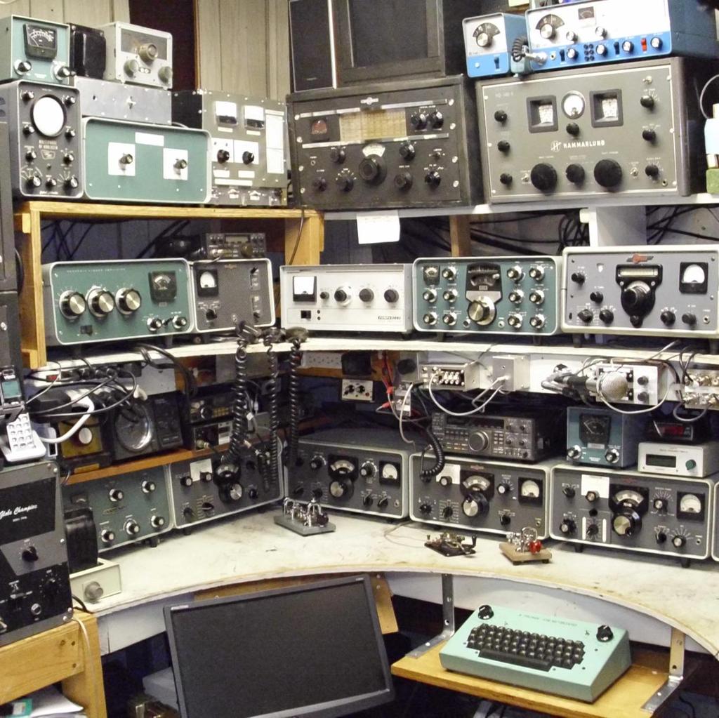 Main operating position, left side: From bottom, 1 st row: Heath SB-500 2-meter transverter, Collins 75S-1 receiver, Collins 32S-1 transmitter, Collins 75S-1 receiver, Collins 75S-3A receiver.