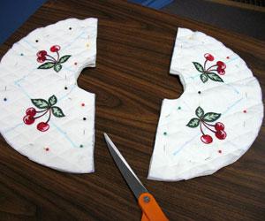 Cut around the embroidered circle and cut along the half circle