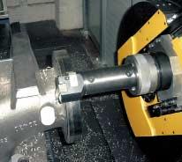 The controlled facing slide enables taper or contour machining and can eliminate turning machine operations.