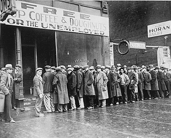 SOUP KITCHENS Unemployed men wait in line for food this particular
