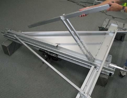 1 ASSEMBLY 15. Fold the lower rear center leg and supports up and away from the Vertical Track Assembly (Fig. 15a).