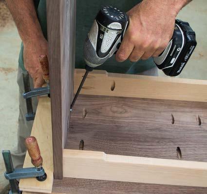 Mark the location of the shelf at the front edge so that you can verify that the shelf did not shift when clamping the right-angle