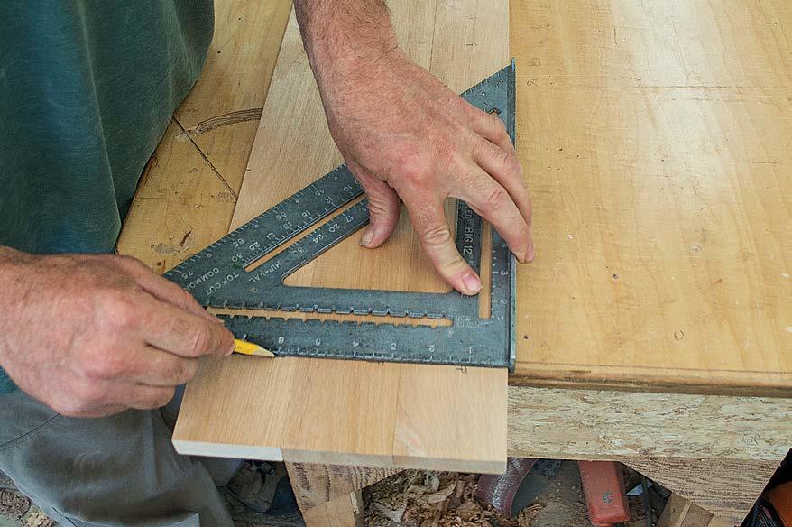 on top, flush up the top edge, and hold with the face clamp. Drive two pocket screws into the top pair of holes. Then move the right-angle jig to the top edge and repeat for the bottom pair of holes.