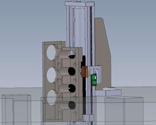The mount is shown in Figure 40. Because the optics are large in diameter, the linear stage travels through a hole in the optical bench, with the servo motor located below the bench.