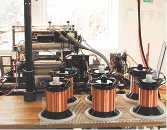 Figure 6: Rear view of a Lundahl coil-winding machine showing wire spools.