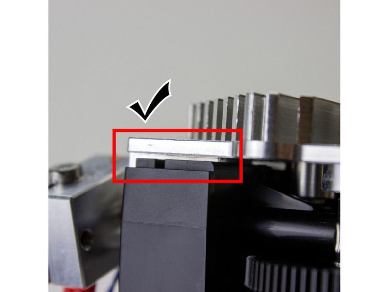 It will not be flush like the plastic Titan lid would be, as the heatsink is flat on the backside.