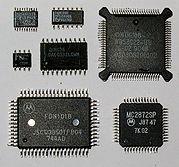 Integrated Circuits (IC s) Surface Mount Device/Technology (SMD or SMT) Small-Outline Integrated Circuit (SOIC), Thin Small-Outline Package (TSOP), Quad Flat Pack (QFP), Plastic Leaded Chip Carrier
