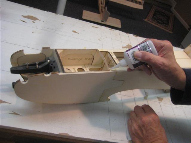 Glue the laser cut balsa wood top deck