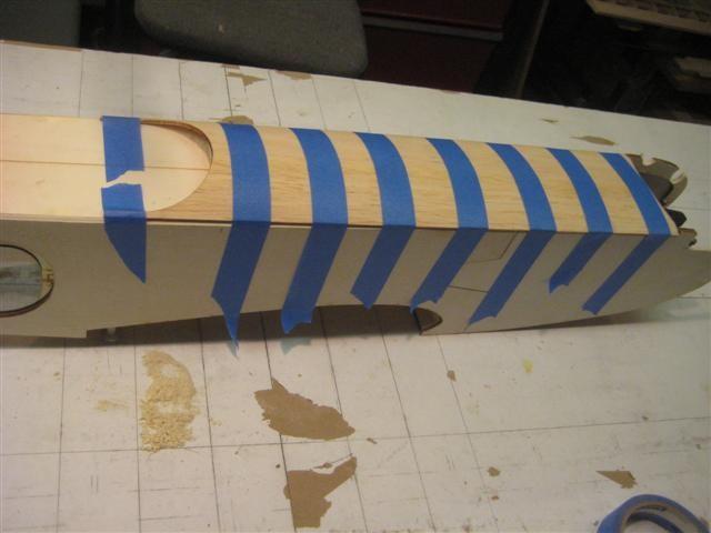 notch in the fuselage sides, and warp