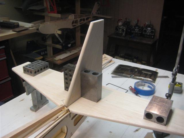 Make sure the fin is perpendicular to the stabilizer by holding it in place with square blocks or triangles.