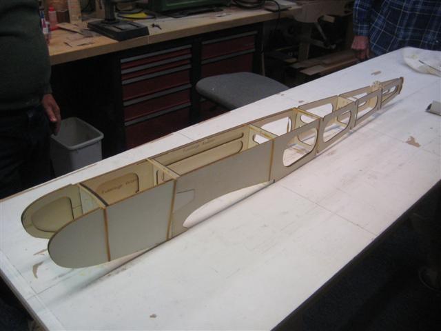 Assemble all the fuselage formers ( F1 through F6 ) between the fuselage side assemblies and hold the