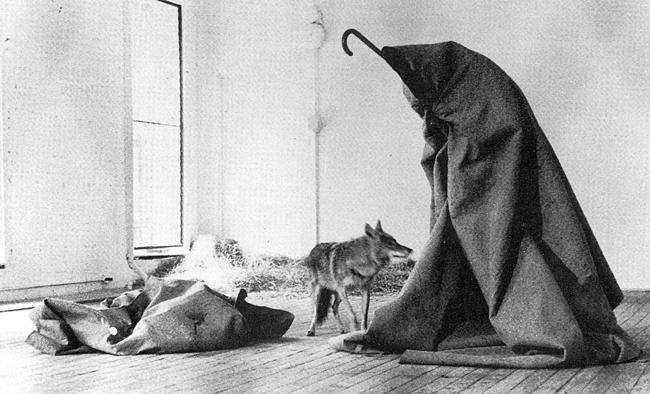 Joseph Beuys, Like America and America Likes Me 1974 Felt blankets, walking stick and gloves, fifty new copies of the Wall Street Journal were introduced each day, which the coyote urinated on.