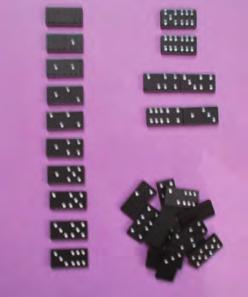 challenge children to add several small numbers. Children should view each domino as the total.