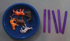 Place a selection of different animals in bowls and ask the children to count the animals accurately then choose the number from the 100 square that is one more or one less