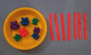 ) Count an irregular arrangement of up to 10 objects. Place a selection of different animals in bowls and ask the children to count out an equal number of lolly sticks.
