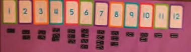 the task within 10 minutes using a sand timer. Use objects and numerals, find totals and match to the corresponding numeral.